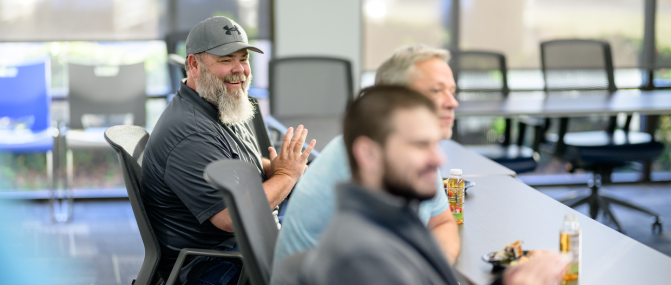 About us - Values people at table learning