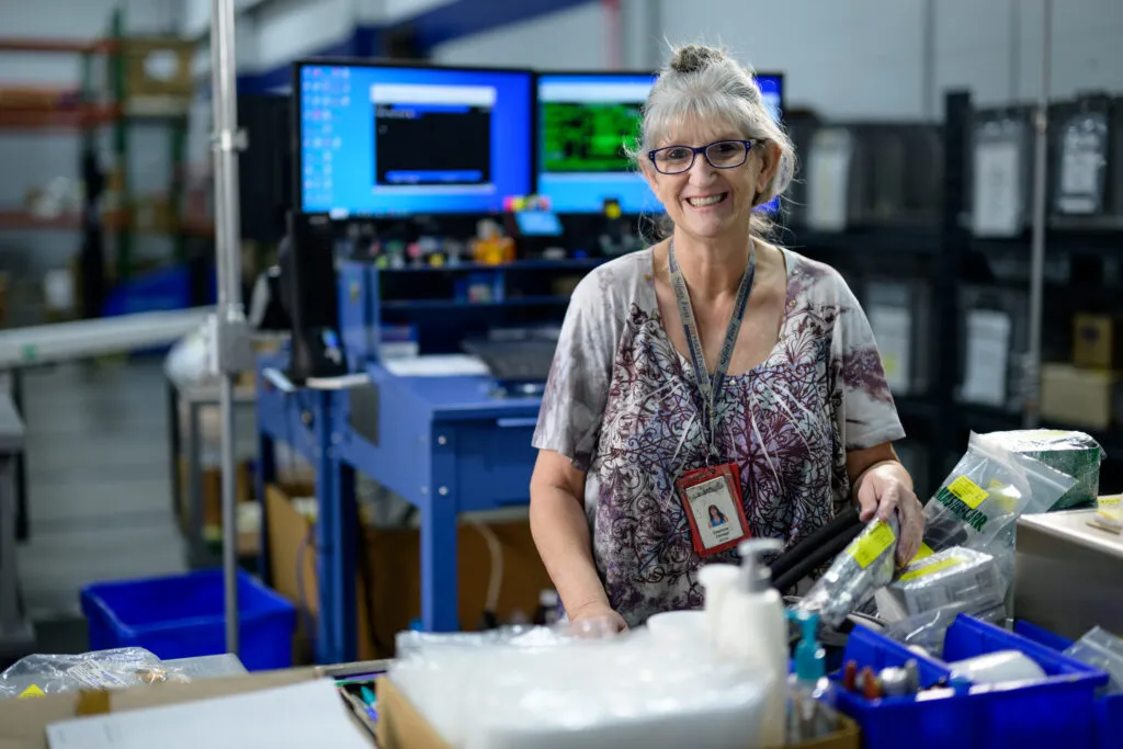 Hartness Woman Working in factory happy Hartness Woman Working in factory happy