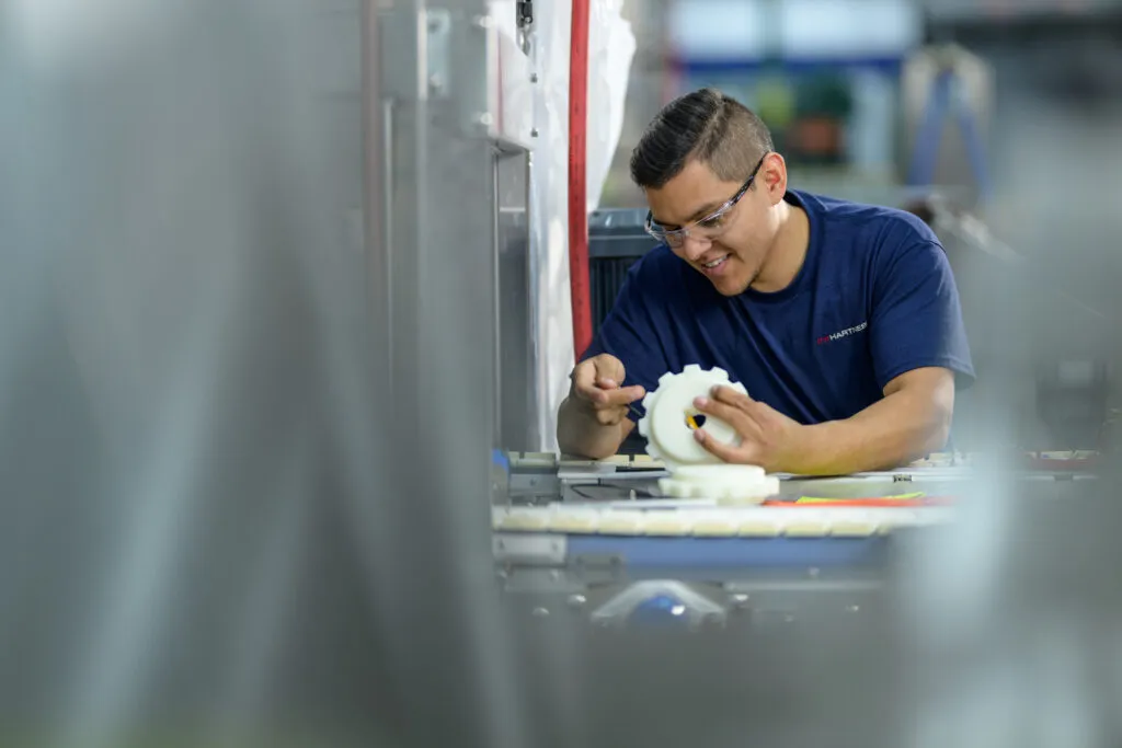 Hartness Working in factory with item Hartness Working in factory with item