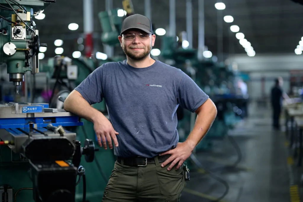 ITW Hartness Man Working in factory ITW Hartness Man Working in factory